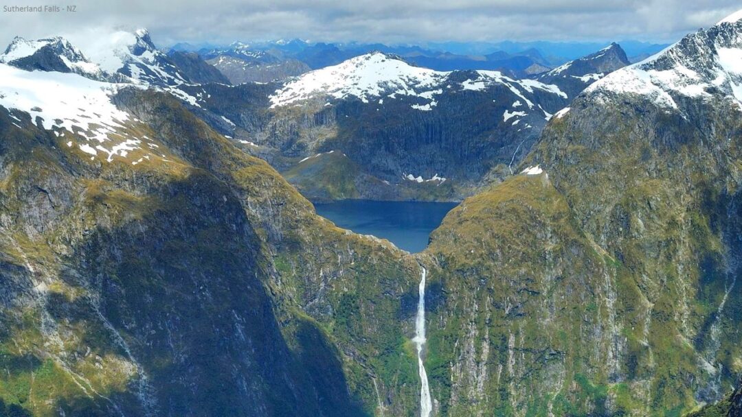 Breathtaking Sutherland Falls cascading down lush mountains in New Zealand. Top 10 Spectacular Waterfalls to Visit.